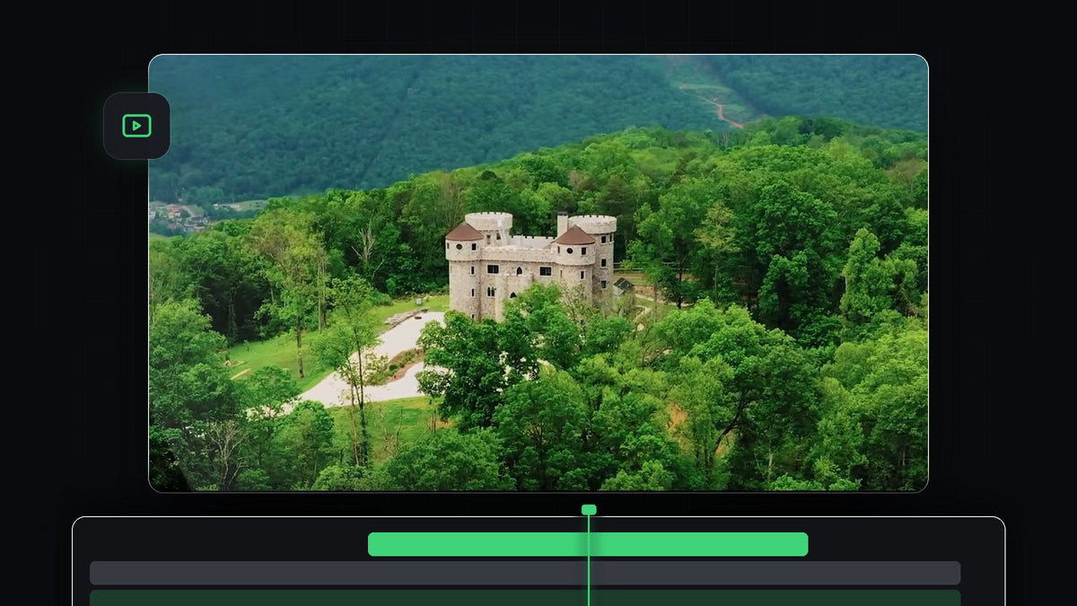 Wide cinematic 21:9 drone shot of a castle surrounded by green forest, framed in Premiere Pro
