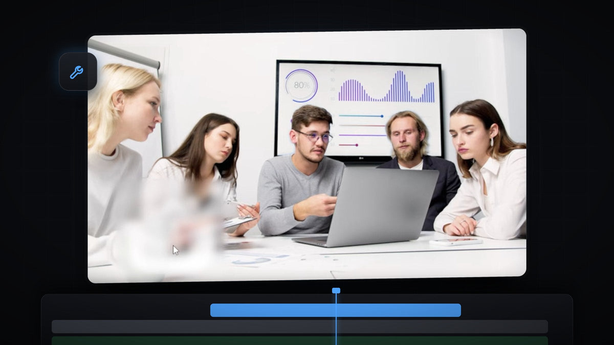 Premiere Pro Program Monitor showing a meeting scene with a watermark blurred into a soft patch