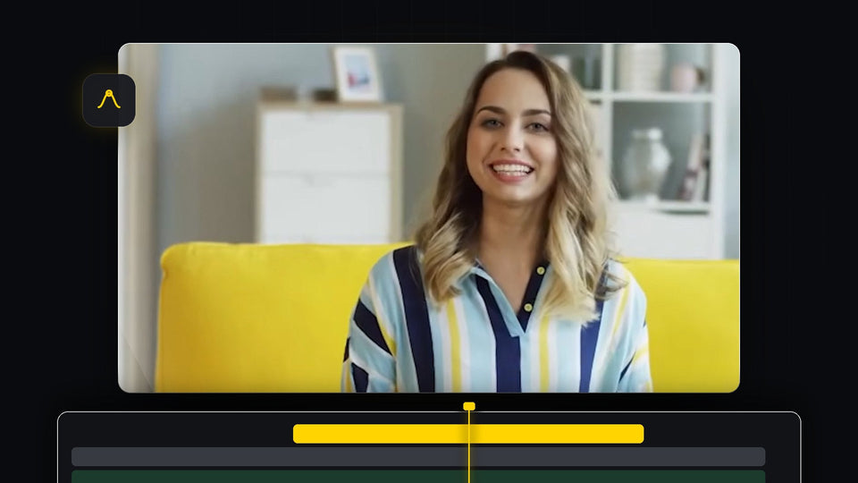 Smiling woman in a striped shirt on a yellow sofa, framed for a zoom in Premiere Pro