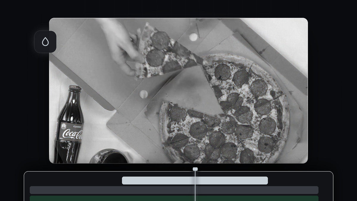 Black and white overhead shot of a pepperoni pizza and a cola bottle graded in Premiere Pro