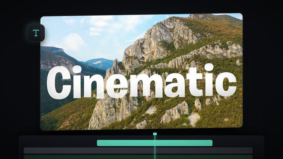 The word Cinematic in large white letters over a mountain landscape, made with a cinematic text fade in Premiere Pro