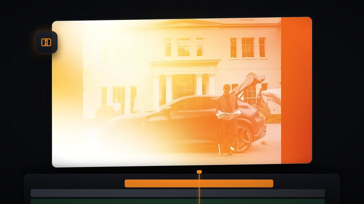Film burn transition in Premiere Pro with an orange light leak covering a shot of a man leaning on a car