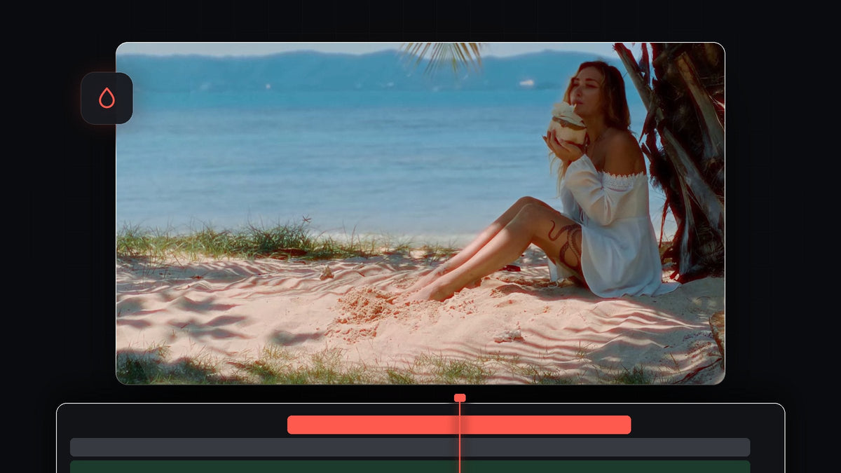 Woman sitting on a sunny beach with warm red halation glow around the highlights in the sand