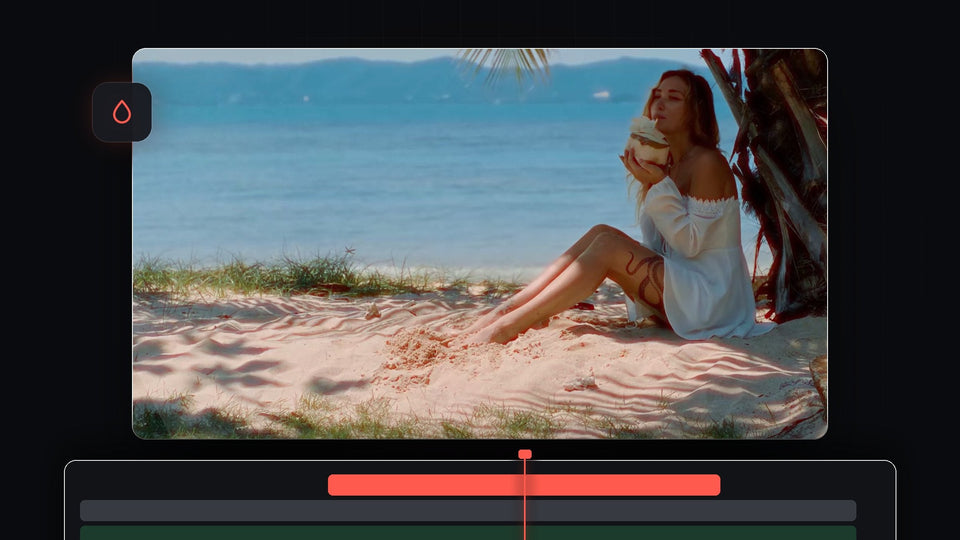 Woman sitting on a sunny beach with warm red halation glow around the highlights in the sand
