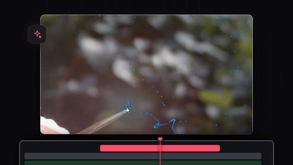 Wand tip with a trail of blue keyframe dots over a blurred forest background in Premiere Pro